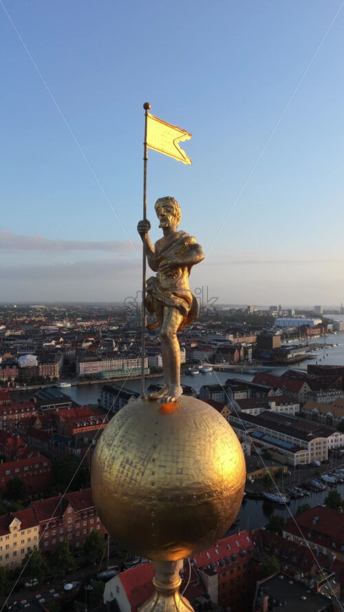 Video - Aerial drone view of the iconic spiral tower of the Church of Our Saviour in Copenhagen, Denmark. Vertical