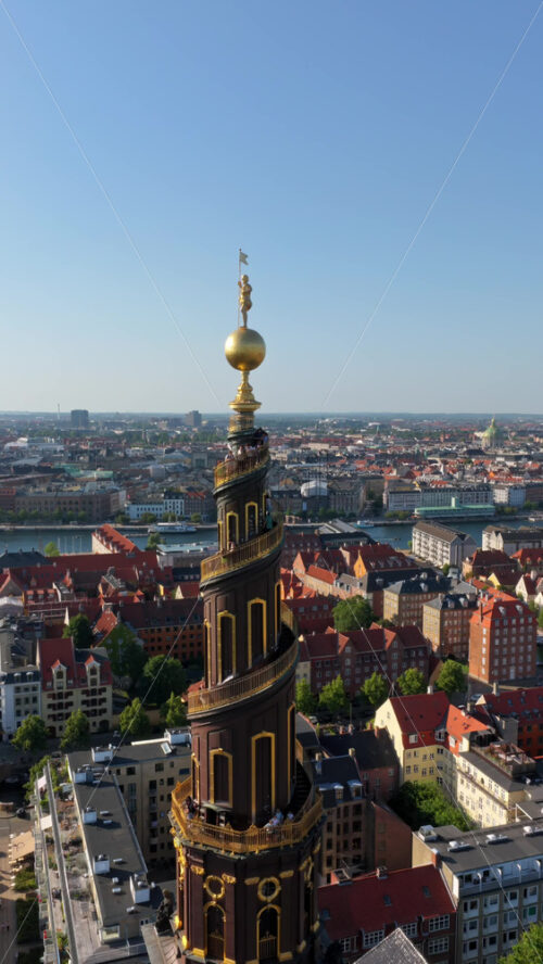 Video - Aerial drone view of the iconic spiral tower of the Church of Our Saviour in Copenhagen, Denmark. Vertical