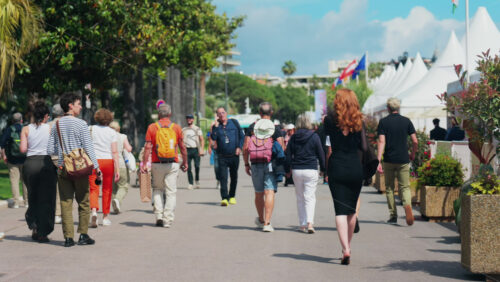 Video - Cannes, France - May 13, 2025: People walking on the streets of the city in daylight