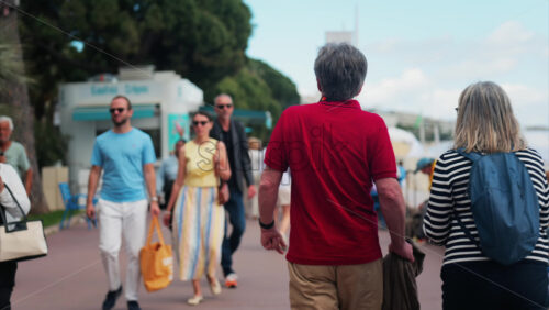 Video - Cannes, France - May 13, 2025: People walking on the streets of the city in daylight