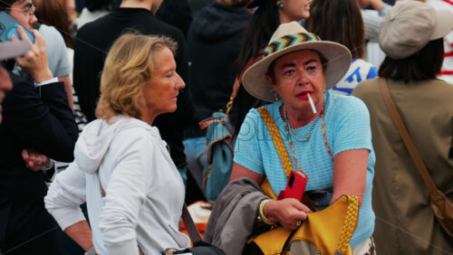 Video - Cannes, France - May 13, 2025: People waiting for celebrities near the red carpet at the Cannes Film Festival