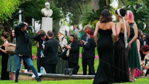 Video - Cannes, France - May 13, 2025: People taking pictures in the Palace of Festivals gardens at the Cannes Film Festival