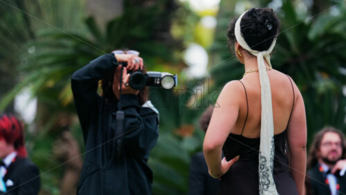 Video - Cannes, France - May 13, 2025: People taking pictures in the Palace of Festivals gardens at the Cannes Film Festival
