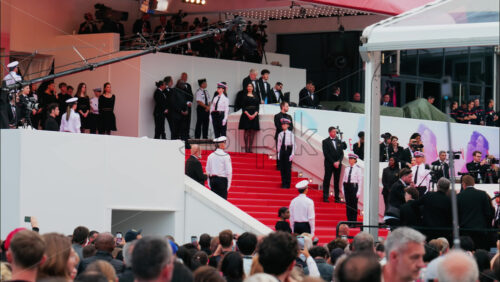 Video - Cannes, France - May 13, 2025: People waiting for celebrities near the red carpet at the Cannes Film Festival
