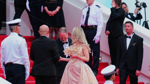 Video - Cannes, France - May 13, 2025: Celebrities posing for photographers on the red carpet at the Cannes Film Festival
