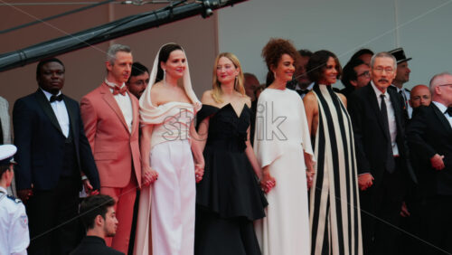 Video - Cannes, France - May 13, 2025: Celebrities posing for photographers on the red carpet at the Cannes Film Festival