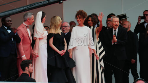 Video - Cannes, France - May 13, 2025: Celebrities posing for photographers on the red carpet at the Cannes Film Festival