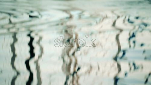 Video - Reflections of boats and masts rippling on the water