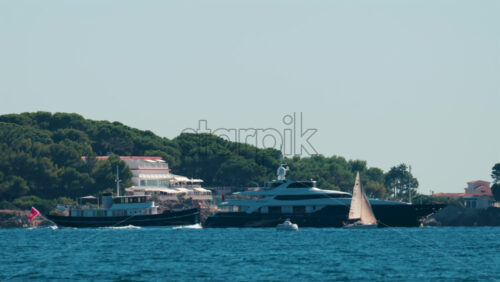 Video - Man swimming freestyle in the calm turquoise water off the coast of Cannes, France