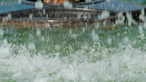 Video - Close up of splashing water droplets in motion