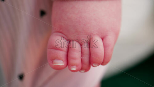 Video - Close up of a baby's small toes and skin texture, highlighting purity and natural details