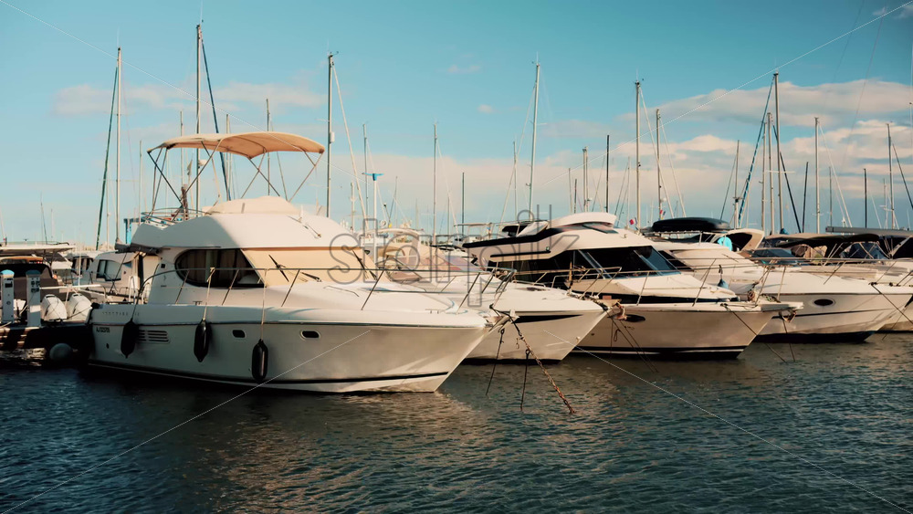 Video - Cannes, France - October 13, 2025: White yachts and sailboats moored in a calm marina