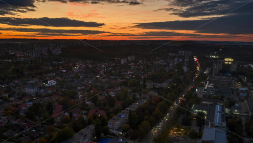 Video – Aerial drone view of cars moving in traffic on the streets of Chisinau, Moldova in the evening time lapse - Starpik Stock