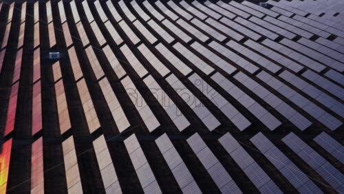 Video - Aerial drone view of a large solar panel field in Moldova at sunset