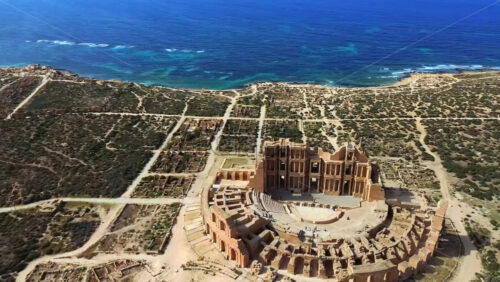 Video - Aerial drone view of the Roman Theatre of Sabratha, one of Libya's most iconic archaeological sites