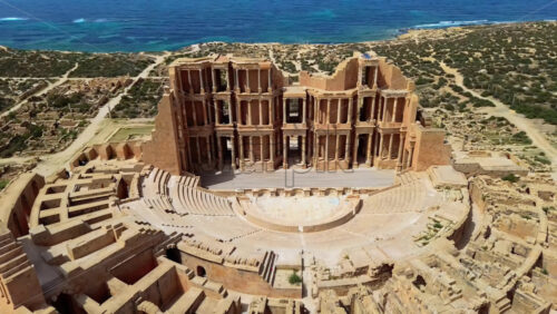 Video - Aerial drone view of the Roman Theatre of Sabratha, one of Libya's most iconic archaeological sites