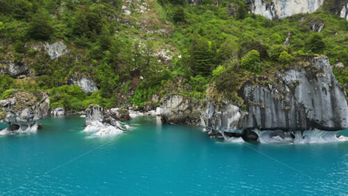 Video - Aerial drone view of the famous marble caves of Patagonia, carved by centuries of water erosion