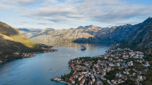 Video – Aerial drone timelapse of Bay of Kotor with large cruise ships and traffic. Sunrise. Montenegro - Starpik Stock