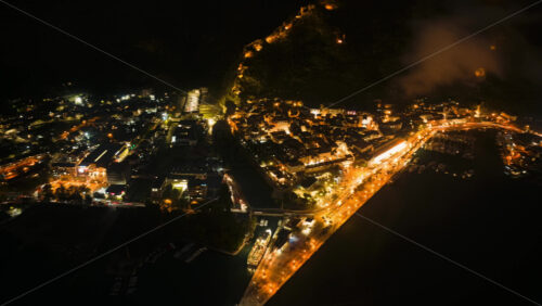Video – Aerial drone timelapse of Kotor, Montenegro at night with car traffic - Starpik Stock