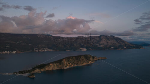 Video – Aerial drone timelapse of sunset over islands near Budva, Montenegro - Starpik Stock