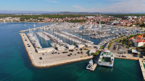 Video – Aerial drone view of Biograd na Moru’s Marina Kornati, one of the largest marinas on the Adriatic. Biograd na Moru, Croatia - Starpik Stock