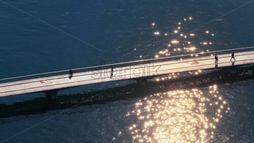 Video – Aerial drone view of Zadar’s pedestrian bridge, connecting the Old Town peninsula with the mainland. Croatia - Starpik Stock