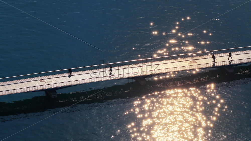Video – Aerial drone view of Zadar’s pedestrian bridge, connecting the Old Town peninsula with the mainland. Croatia - Starpik Stock