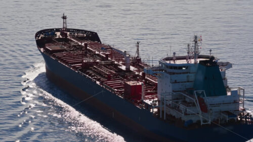 Video – Aerial drone view of an oil tanker traveling across open Adriatic waters, close-up - Starpik Stock