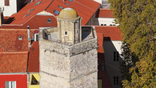 Video – Aerial drone view of an old stone defensive tower featuring a weathered dome and medieval architecture in Zadar, Croatia - Starpik Stock