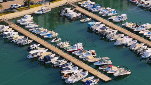 Video – Aerial drone view of recreational boats and small yachts anchored at Zadar Marina - Starpik Stock