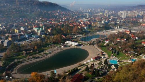 Video – Aerial drone view of the Pannonian Lakes complex in Tuzla, showing the artificial salt lakes, beach areas, walking paths, and recreational zones - Starpik Stock