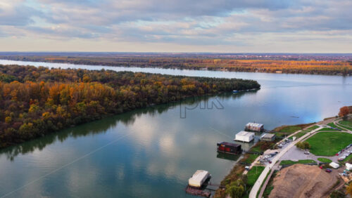 Video – Aerial drone view of the Sava River near Ada Ciganlija in Belgrade, Serbia - Starpik Stock