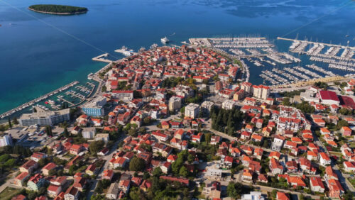 Video – Aerial drone view of the extensive marina in Biograd na Moru, showcasing pier after pier filled with boats and sailboats. Croatia - Starpik Stock