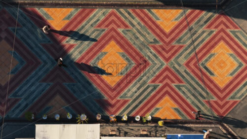 Video – Aerial drone view of the iconic geometric mosaic pavement in old town of Tuzla, Bosnia and Herzegovina - Starpik Stock