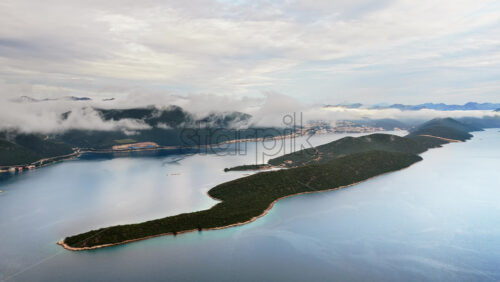 Video – Aerial drone view of the rugged limestone islands of the Sibenik Archipelago in Croatia - Starpik Stock
