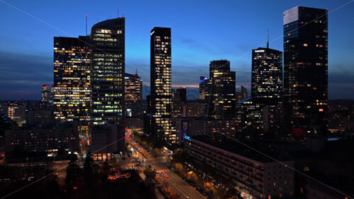 Video – Warsaw, Poland – October 30, 2025: Aerial drone view of modern skyscrapers near Rondo Daszynnkiego and surrounding business district - Starpik Stock