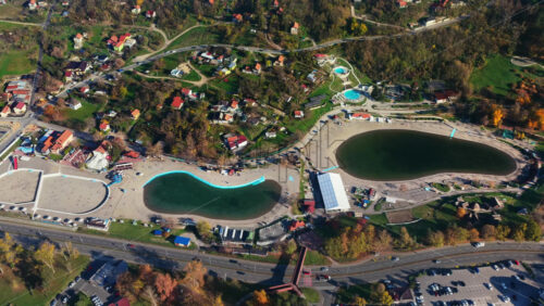 Video - Aerial drone view of the Pannonian Lakes complex in Tuzla, showing the artificial salt lakes, beach areas, walking paths, and recreational zones