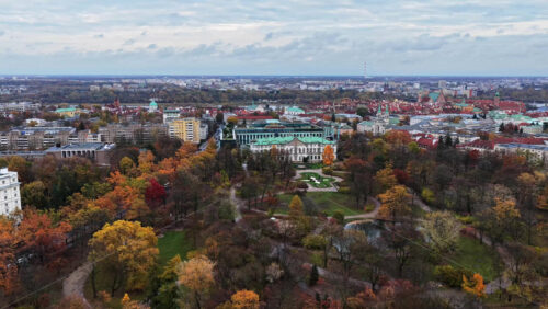 Video - Aerial drone view of the Saxon Garden in late autumn, with panoramic views toward the historic Krasinski Palace and surrounding Srodmiescie district