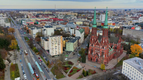 Video - Warsaw, Poland - October 31, 2025: Aerial drone view of the facade of St. Florian Cathedral in Praga, featuring its brickwork and symmetrical Gothic design