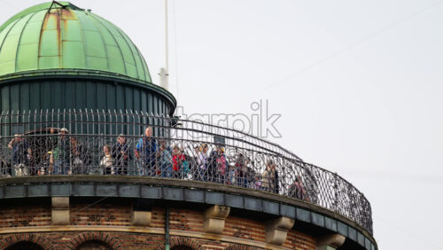 Video - Copenhagen, Denmark - August 4, 2025: Tourists standing on the observation deck of the Round Tower