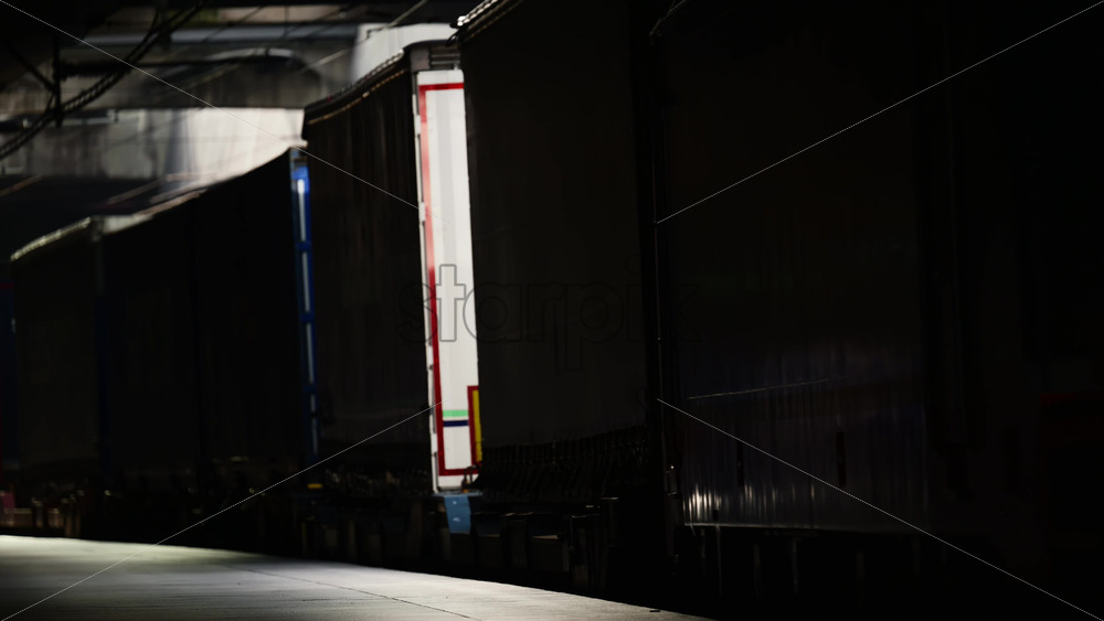 Video - Copenhagen, Denmark - August 5, 2025: Cargo train arriving on tracks