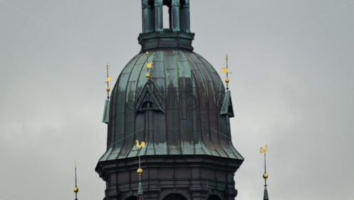 Video - Architectural detail of an old brick tower featuring a clock and bell chamber. Copenhagen, Denmark