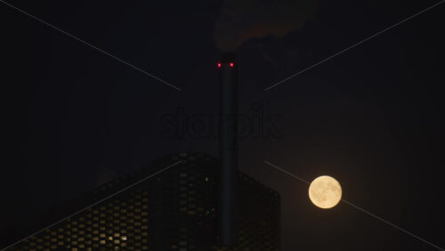 Video - Full moon illuminating the Copenhill Amager Bakke waste to energy plant and its chimney at night. Copenhagen, Denmark