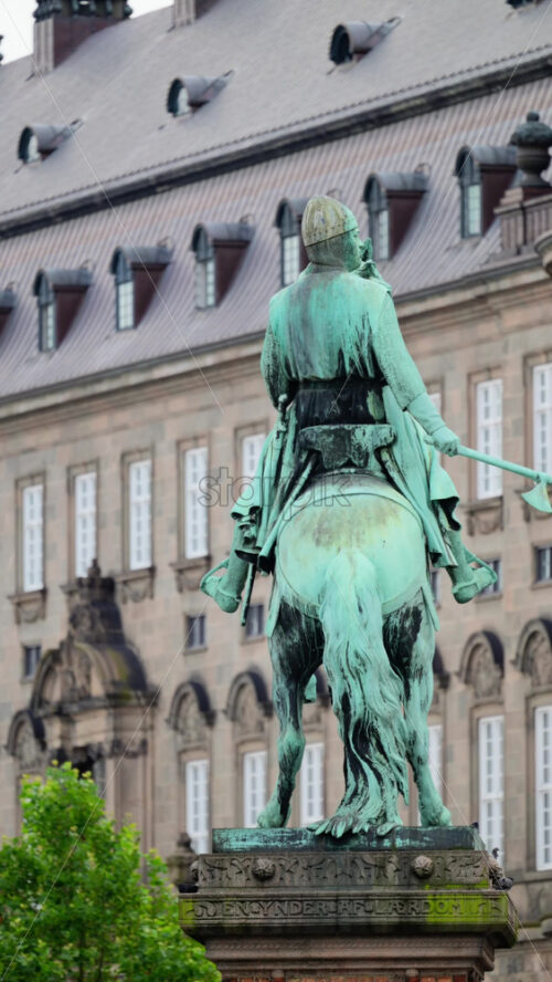 Video - Bronze equestrian statue of Absalon on a plinth with Christiansborg Palace in the background. Copenhagen, Denmark