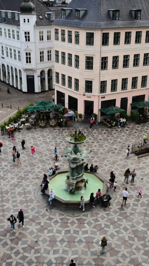 Video - Copenhagen, Denmark - August 6, 2025: People walking on Amagertorv enjoying city life