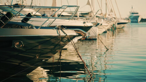 Video - Close up of the bow of a luxury yacht with mooring ropes and metal fittings visible