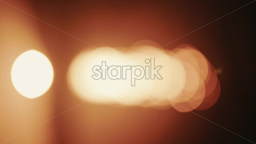 Video - Abstract, out of focus shot of the sun and its reflection on the sea. Vertical