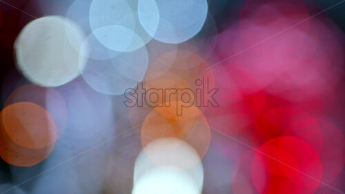 Video - Abstract composition of colorful out of focus lights blending pink, blue, and white tones