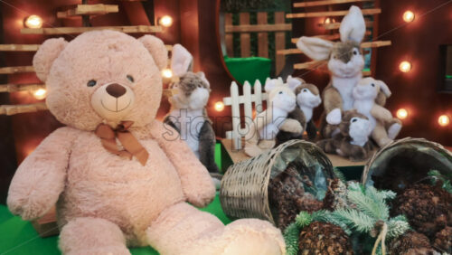 Video - A festive shop window display featuring plush toys and Christmas decorations