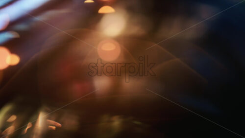 Video - Close up of a camera lens showing curved glass elements and internal reflections